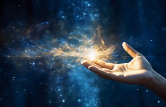 An open hand sticks out into the picture and golden sparks fly out of it, blue background